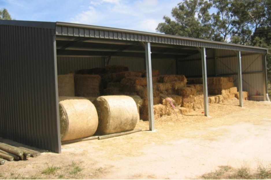 hay stored in a steel shed