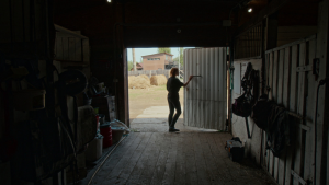 woman standing by the door
