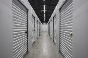 Self storage facility, metal doors with locks. Moving, storage co