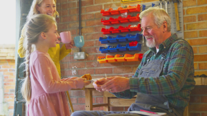a girl and an elderly man