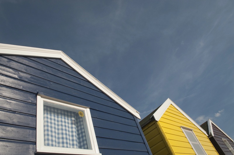 steel sheds in blue and yellow