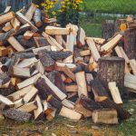 Background of firewood. Preparation of firewood for the winter