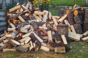 Background of firewood. Preparation of firewood for the winter
