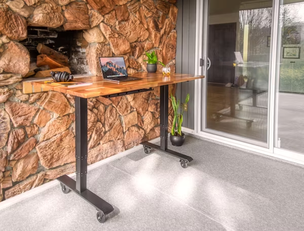 home office with a desk and laptop