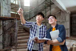 2 men checking the construction home