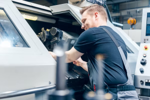man working on a machine