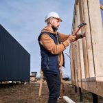 construction worker working on a shed