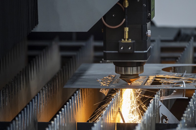 A laser cutting machine actively cutting metal