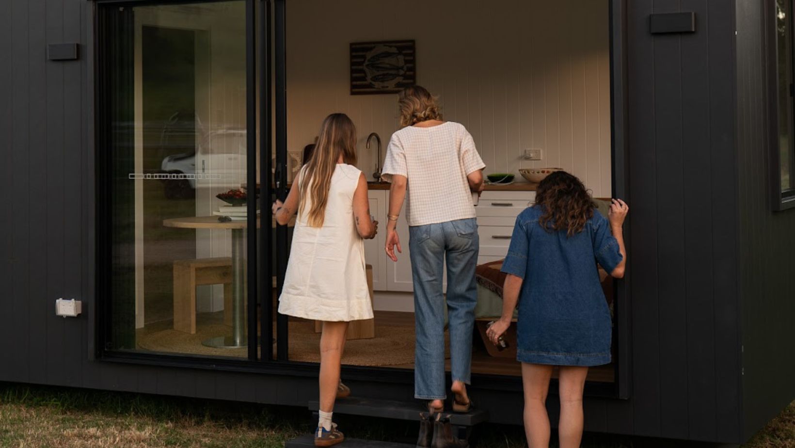 Lifestyle Girls Entering Dark Cabin