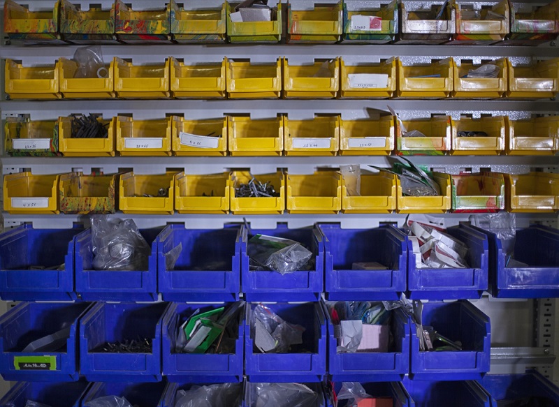 Set of working tools on board background