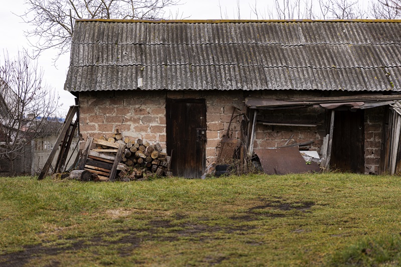 View of abandoned and decaying house in nature