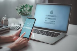 Woman hand enter a one time password for the validation process
