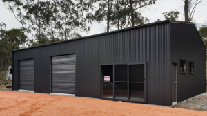 steel shed with windows, roller doors and PA Door
