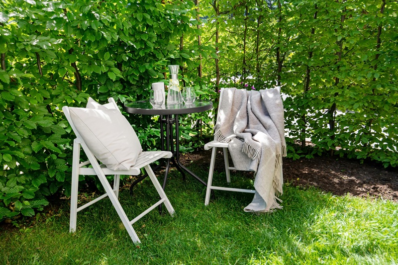Chairs with Pillows Outside on Grass