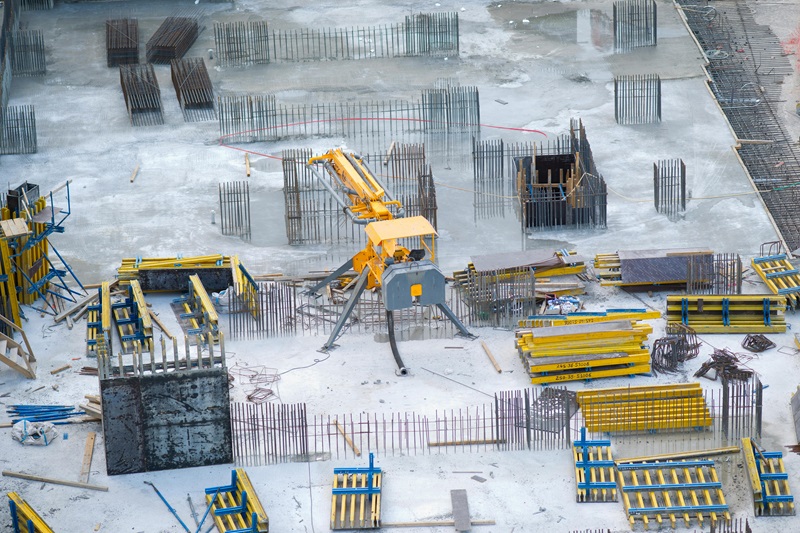 Yellow and Black Heavy Equipment on Snow Covered Ground