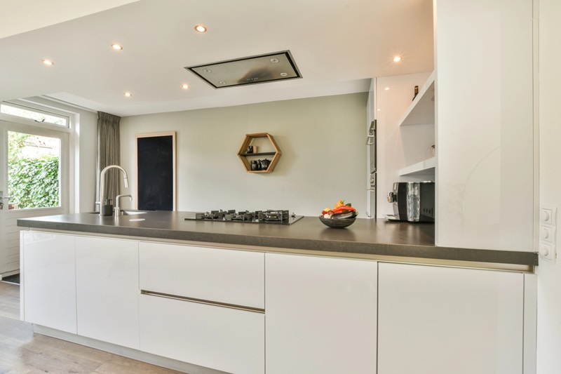 A contemporary kitchen featuring sleek cabinetry