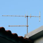 An old television antenna on a rooftop