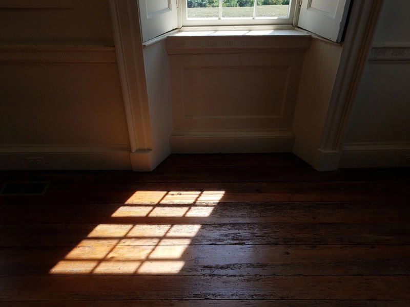 Light from glass window on wood floor Light from glass window on wood floor