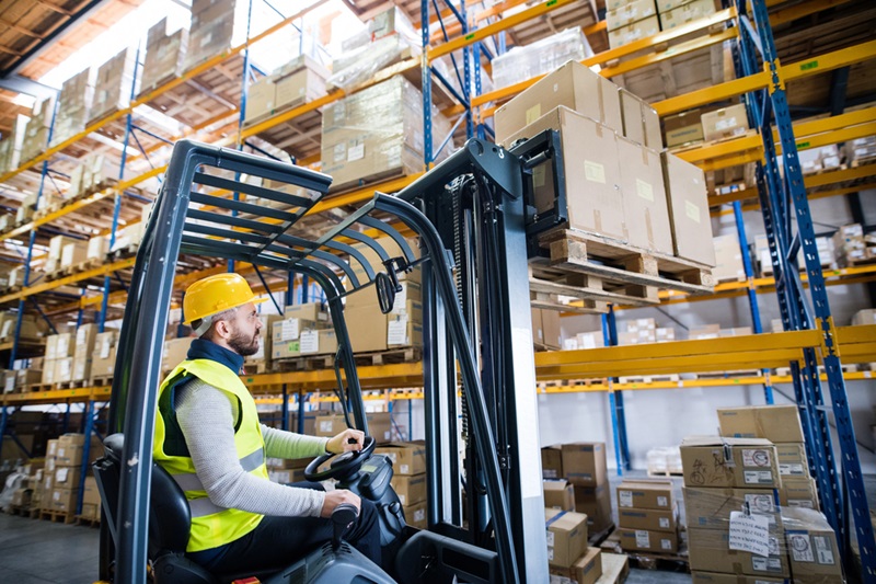 Warehouse man worker with forklift Warehouse man worker with forklift