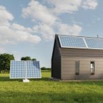 cabin powered by rooftop and ground-mounted solar panels