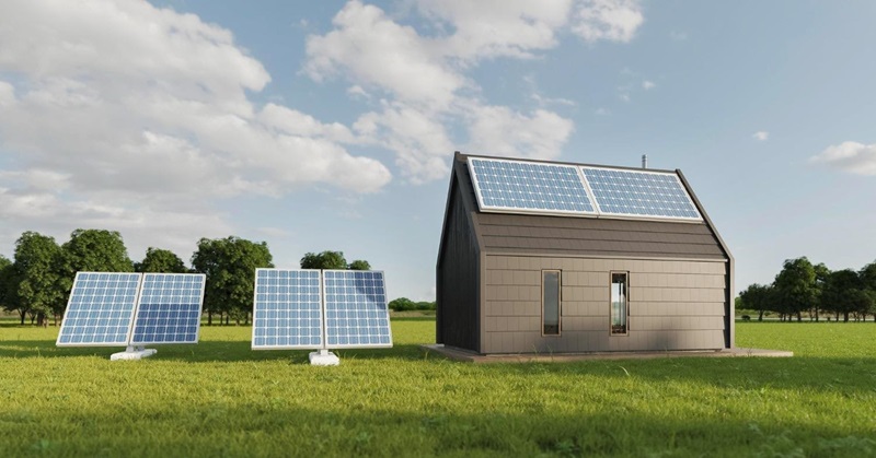 cabin powered by rooftop and ground-mounted solar panels