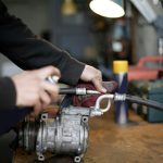detailed action shot of an automotive component being cleaned