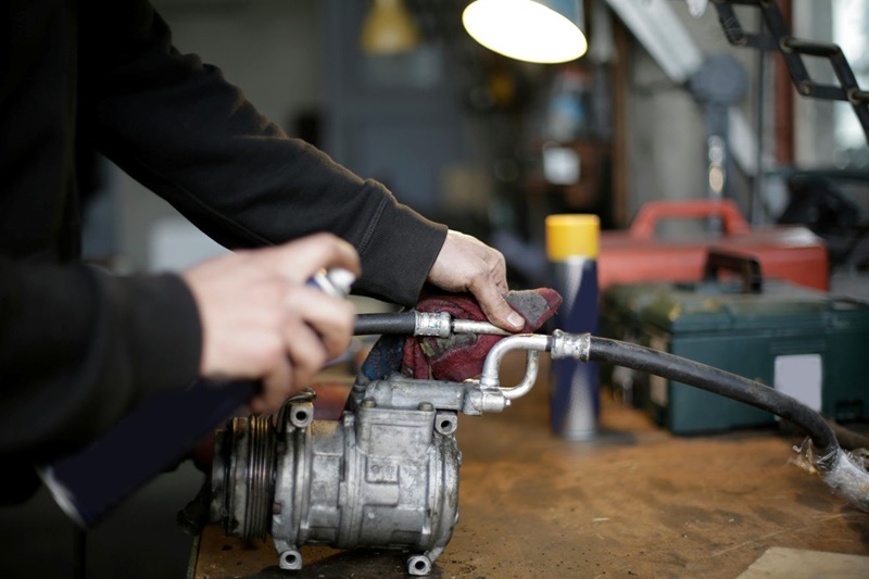 detailed action shot of an automotive component being cleaned