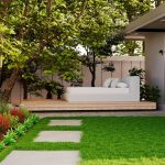 A serene outdoor patio with lush garden, wooden decking, and hammock seating