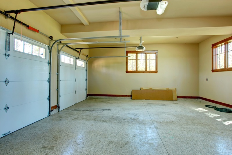 Empty garage with roller doors Empty garage with roller doors