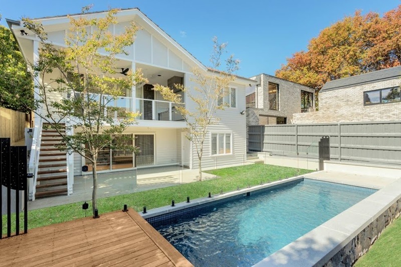 Modern Two-Story Backyard with Inground Swimming Pool