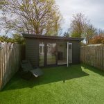 a small shed in a backyard