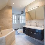 Architecturally built bathroom with luxury tiling