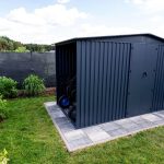 Backyard Storage Shed with Integrated Open Side Bay