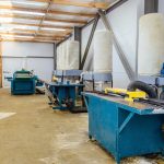 Circular blade saw machine tools in carpentry workshop