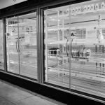 grayscale photo of glass window