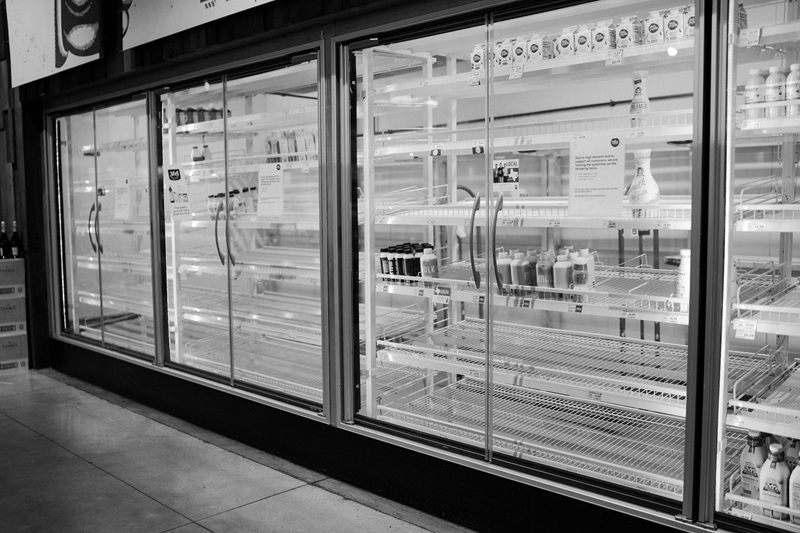 grayscale photo of glass window grayscale photo of glass window