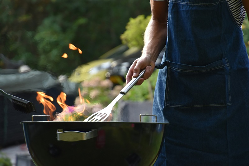 man grilling outdoor man grilling outdoor