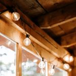 white pendant lamp turned on during daytime