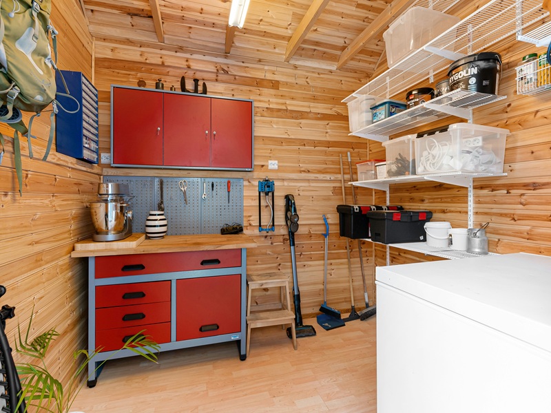 A garage with a lot of storage space A garage with a lot of storage space