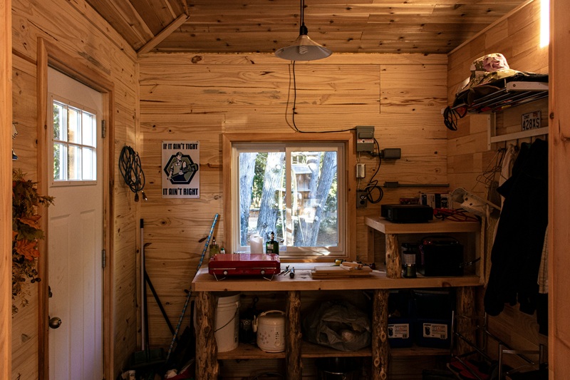 brown wooden table near window brown wooden table near window