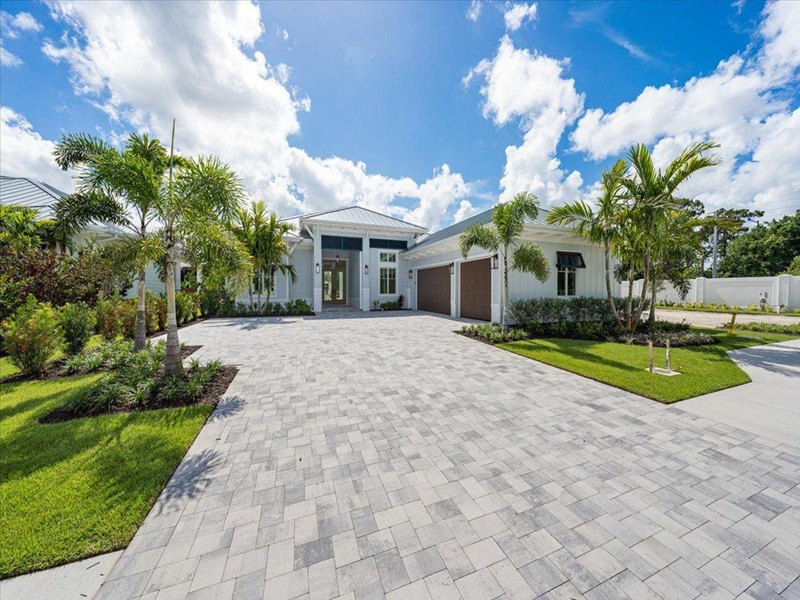 A well-maintained paver patio or driveway at home A well-maintained paver patio or driveway at home
