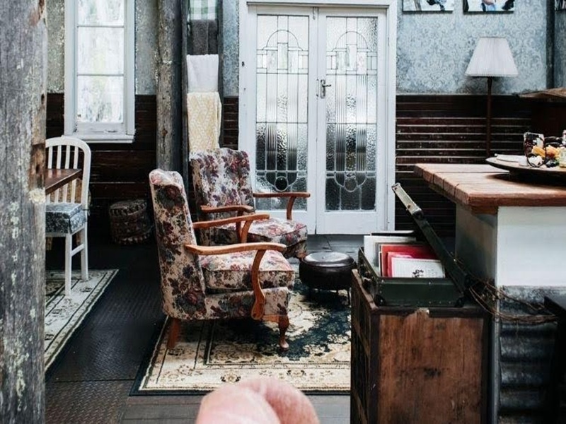 Cozy Antique Lounge Space with Weathered Timber Accents