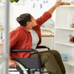 Person in Wheelchair Reaching for Upper Pantry Shelves