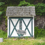 Rustic Wooden Garden Storage Shed with Cedar Shingle Roof