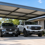 carport with 2 cars parked